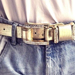 Cache gold embellished belt.